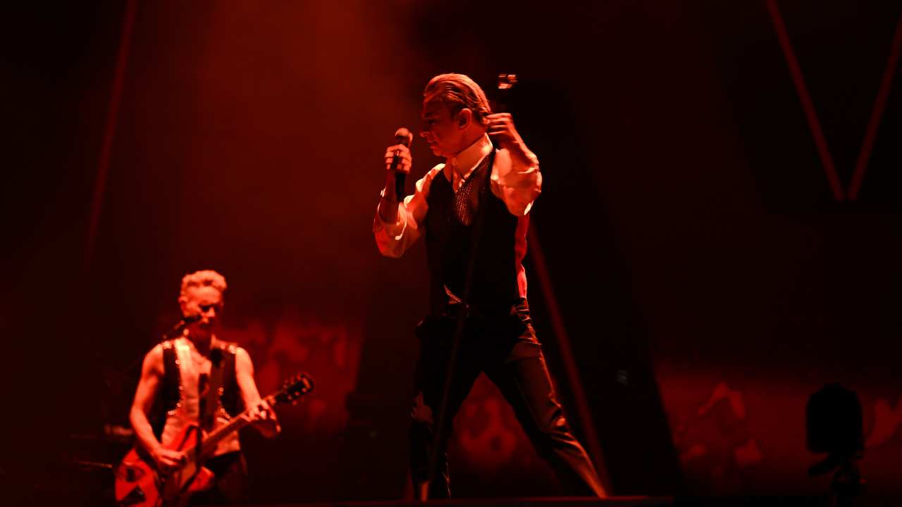 Dave Gahan and Martin Gore under red lights